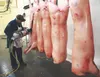 Longtime Mt. McKinley Meat and Sausage plant manager Frank Huffman "breaks" pig carcasses in this Frontiersman file photo from November 2015. Huffman is one of three managers who have told th