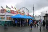 Bear Paw Festival goers don't let the rain stop them from having a good time with their friends and loved ones. Jacob Mann/Frontiersman