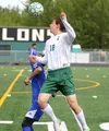 Colony senior Landon Basner heads the ball past a Kodiak player during a 9-1 win over the Bears in the Northern Lights Conference quarterfinals May 21 at Colony High. JEREMIAH BARTZ/Frontiers