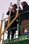 Despite the cold and wind, and in true Alaskan form, a hydraulic lift was needed to light the Menorah on December 26, 2024. Katie Stavick/Frontiersman