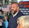 Alaska's new candidate for governor, Adam Crum, speaks with supporters during a rally Tuesday in Wasilla. Katie Stavick/Frontiersman