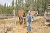 WILL ELLIOTT/Frontiersman Tim Wark spends some time with his
horse earlier this week. The Valley resident is descended from
British colonists and Natives present at the Jamestown colony in
Vi