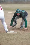Colony’s Ben Ross gets tagged out as he slides across home plate during the bottom of the fifth inning Thursday during the 2013 Southcentral Conference Championships at Wasilla Senior Field. 