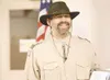 ROBERT DeBERRY/Frontiersman Assistant Scoutmaster Dan Kander
stands in front of family, friends and the Scouts of Troop 300
after being awarded the National Scoutmaster Award on Monday.