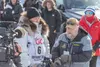 Rookie Expedition musher Kjell Inge-Rokke taking his place on the start line with Iditarod CEO Rob Urbach, right, and race director Mark-Nordman at the restart. J. David McChesney/Frontiersma
