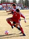 Wasilla junior Chris Odom battles Colony senior Mike Benson for
the ball during the Knights 1-0 win over the Warriors at Wasilla
High School on Monday. JEREMIAH BARTZ/ FrontiersmanPhoto by