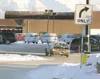A driver makes a illegal left turn from the north entrance at
the ROBERT DeBERRY/Frontiersman Wal-Mart Supercenter in Wasilla
onto the Seward Meridan Parkway. The penalty for making an illega
