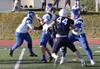 Palmer's Nolan Garner passes under pressure from Soldotna's Logan Myers on Friday, Aug. 15, 2025, at Justin Maile Field at Soldotna High School in Soldotna, Alaska. Jeff Helminiak/Peninsula C