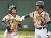 Mat-Su Miners David Bermudez and Ricky Nunez dap one another Jeff Helminiak / Peninsula Clarion