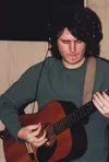 Submitted photo Josh Fryfogle strums his guitar during the
recording of his CD, "No Previous Record."