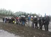 A lineup of local dignitaries tosses ceremonial shovels of dirt in the air to mark the beginning of construction on the new Redington Sr. Jr./Sr. High School, which is set to open in fall 201