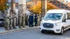 U.S. service members and Task Force Eagle staff wave goodbye to the last Afghan guests departing Nov. 16 from the Living Support Area at Fort Lee, Virginia. It marked the close of the install