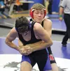 Soldotna's Seth Hutchison battles Wasilla's Isaiah Elvsaas in a 126-pound match of the semifinal round of the Lancer Smith Memorial wrestling tournament Nov. 20 at Palmer High School. Wasilla