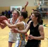 Monroe Catholic and Colony players battle in the paint during the 2023 ASAA 4A state tournament. Bruce Eggleston/matsusports.net