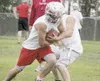 A group of offensive players works through a drill. Wasilla will
play Skyview, West Valley and Kenai during the first three weeks of
the 2011 season.(JEREMIAH BARTZ/Frontiersman)