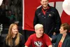 Holli Schachle, right, shares a story about her son, Brayden Schachle, center, and his reluctance to join the Wasilla diving team. After not originally on board with the idea, Schachle is now