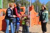 Wasilla Mayor Bert Cottle and city officials cut the red, ceremonial ribbon with local children. Jacob Mann/Frontiesman