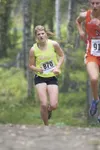 Wasilla’s Jenna Ford works her way up an incline during the
Palmer Invitational at Palmer High School. (ROBERT
DeBERRY/Frontiersman) Robert DeBerry