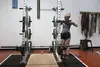 Junior Kayla Munday sets up weights in preparation for her work out during Zero Hour at 6:30 a.m. This is the eighth year for Zero Hour at Wasilla High School, a physical education class offe