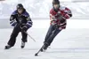 Noah Gillespie, skating on a team sponsored by Rep. Mark Neuman in the U18 division, moves the puck forward during a game of 4-on-4 pond hockey on the first day of the 2017 Last Frontier Pond