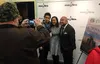 Jessie Wei, center, has her photo taken with well-wishers following the screening of her film, 'In the Now' Saturday night at the Alaska Experience Theater. To her right is Joshua Branstetter