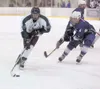 Colony senior Alex Svoboda moves the puck down the ice during an
overtime loss to the  Soldotna Stars at the Curtis D. Menard
Memorial Sports Center in Wasilla. The Knights rebounded with a 3