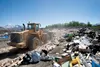 A large front-end loader pushes trash at the construction and demolition pit at the Mat-Su Borough Central Landfill off 49th State Street. The landfill is  working out of its third cell, but 