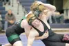 ROBERT DeBERRY/Frontiersman Colony Knight Tim Edwards grapples
with Wasilla Warrior casey Katchinska during the Lancer Smith
Memorial Wrestling Tournament at Palmer High school