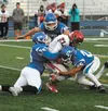 Palmer's Austin Farris, Nick DeBach and Jeff Glynn tackle Kenai's Zach Tuttle during a 21-7 win over the Kardinals Friday, Sept. 23, 2016, at Palmer High School. Courtesy of Bruce Eggleston/m