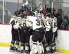 The Colony Knights celebrate a 6-3 win over rival Wasilla in the ASAA First National Cup Division I hockey third-place game Saturday afternoon at the Menard Arena in Wasilla. Jeremiah Bartz/F