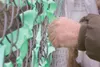 GREG JOHNSON/Frontiersman Dozens of Valley residents took part
of their Sunday afternoon to tie ribbons to help bolster awareness
of child abuse and neglect.