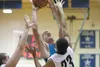 Palmer senior forward Hayden Niekamp grabs a rebound and puts it back up for two points during Palmer’s Northern Lights Conference Championships win over Colony Saturday in Soldotna. The Moos