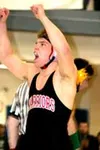 Jed Wade celebrates his fourth state title after a 9-3 win over
Dimond's Keenan Chirhart. Photo by JEREMIAH BARTZ/
Frontiersman.