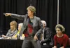 Wasilla head coach Jeannie Hebert-Truax directs her players during an overtime win over Colony March 24, 2016, during the first round of the ASAA 4A girls state tournament. The Warriors captu