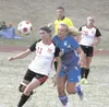 JEREMIAH BARTZ/Frontiersman Palmer senior Megan Stark, right,
battles for the ball during a 3-0 loss to Kenai during the Northern
Lights Conference quarterfinals on Thursday at Palmer High
Sc