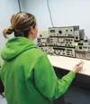 Elizabeth Maschmeyer, 3rd Maintenance Squadron Precision Measurement Equipment Laboratory calibration technician, calibrates a sound system at Joint Base Elmendorf-Richardson, Alaska, Oct. 23