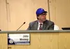 Mat-Su Borough Manager John Moosey put on a Palmer baseball cap during a Ma-Su Borough Assembly meeting Jan. 7. Tim Rockey/Frontiersman