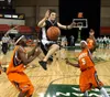 Colony senior Rhett Magner leaps for a loose ball between West
Anchorage guards Deray Wilson (left) and Jordan Jamestown (right).
Magner and the Knights fell short in their bid for Colony's f