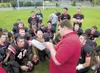 ROBERT DeBERRY/Frontiersman New Houston High School head
football coach Todd Whitehurst talks defensive strategy to the
Hawks during halftime of a game this past season at Houston High
School