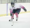 ROBERT DeBERRY/Frontiersman Alaska forward Nardo Nagtzaam skates
the puck down the ice during a game earlier this season. Nagtzaam,
a native of the Netherlands, is playing for Team Netherland