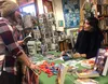 MATT HICKMAN/FrontiersmanRomance novelist Jackie Ivie signs a copy of her new book “Penetrate” at Fireside Books in Palmer on Saturday.