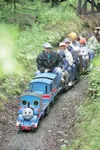 ROBERT DeBERRY/Frontiersman Alaska Live Steamers engineer Steve
Carrington rolls toward the tunnel Saturday morning at the Alaska
Live Steamers train depot. The miniature trains are built to 