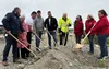 With shovels in hand, business and civic leaders gathered to recognize a decade-long dream realized as ground was broken for the Hilton Homes2 Suites, which will be located at the Shoppes at 