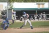 ROBERT DeBERRY/Frontiersman Palmer’s Gus Topp connects with a
Kodiak pitch during the sixth inning of Friday’s semifinal game at
the Southcentral Conference Championships at Hermon Brothers F