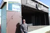 Cory Hughes stands in front of the Palmer Ale House Summer Concert Series stage. Jacob Mann/Frontiersman