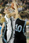Colony junior forward Maci Eisenhower goes up for two points
during the first half of Saturday's championship game against the
Chugiak Mustangs in Anchorage. (ROBERT DeBERRY/Frontiersman)