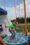 Byer Westerberg of Wasilla figured out the giant bubble contraption at Friday’s Ptarmigan Pediatrics Summer Health Fair. While most of those trying to encase themselves in a giant bubble were