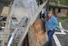 Rachel Sayen-Lambert checking on a Williwaw property that they previously cleaned up. She found a makeshift tent from debris. Jacob Mann/Frontiersman
