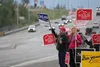 Rep. DeLena Johnson waves a campaign sign at the corner of the Parks Highway and Palmer-Wasilla Highway Aug. 18. Courtesy of Erick Cordero Giorgana