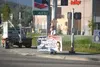 Palmer resident Sidney Hill stands on the corner of the Palmer-Wasilla Highway and the Glenn Highway with his ‘impeach Obama’ sign in this 2011 file photo. Hill was found not guilty in a Palm